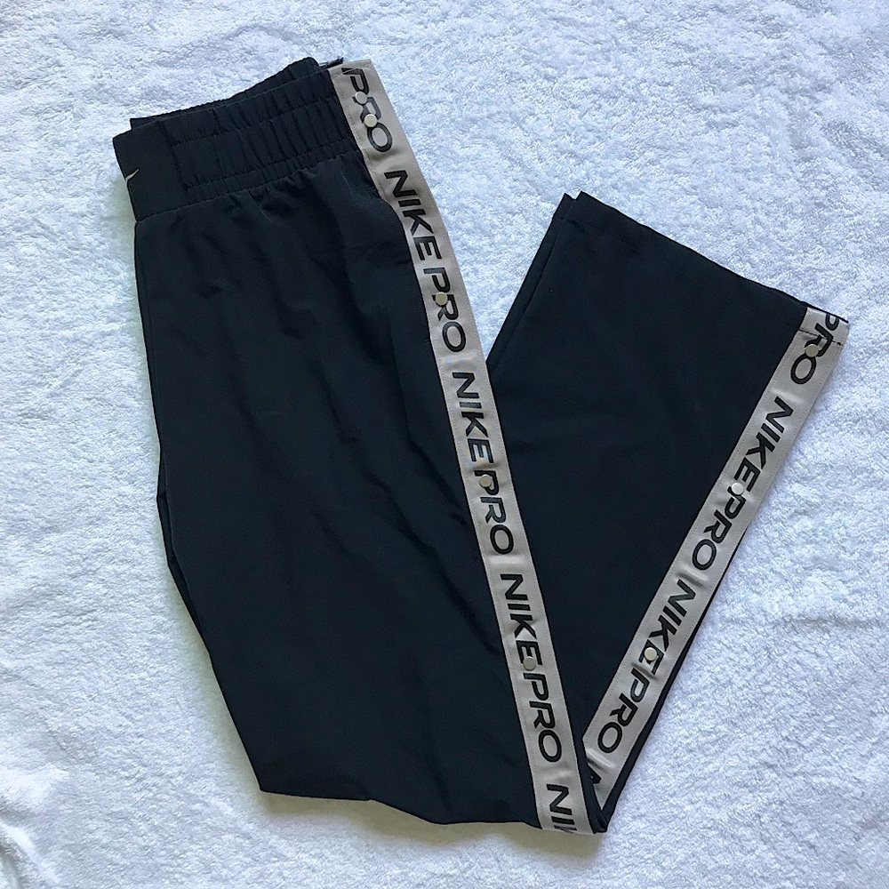Nike pro women tear away full snap up pants. Size medium